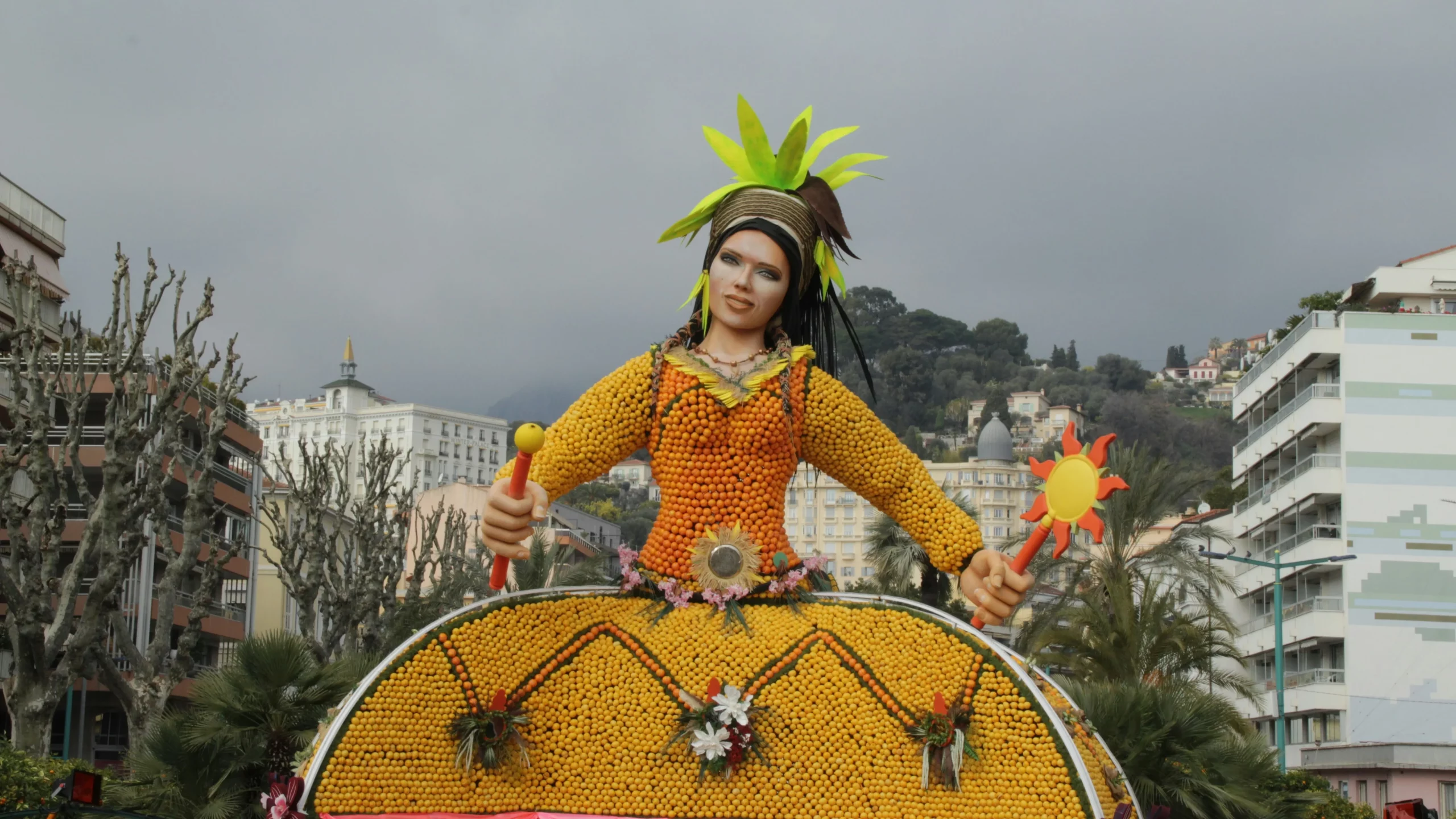 orange figure in the middle of the picture, which is driven around the streets of the Amalfi Coast
